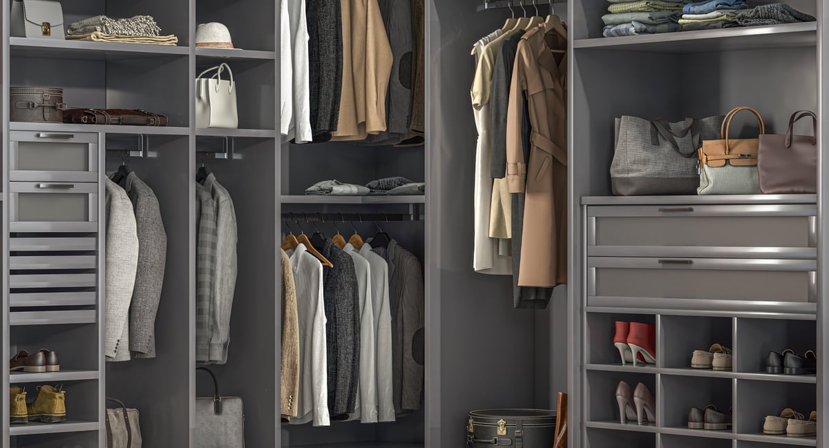 Organized walk-in closet with custom shelving and storage