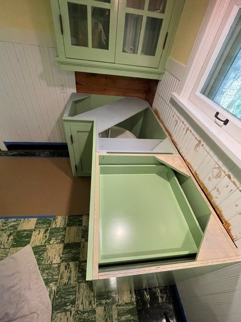 1920 historic cabinet replication – sage green custom cabinets with glass-front doors